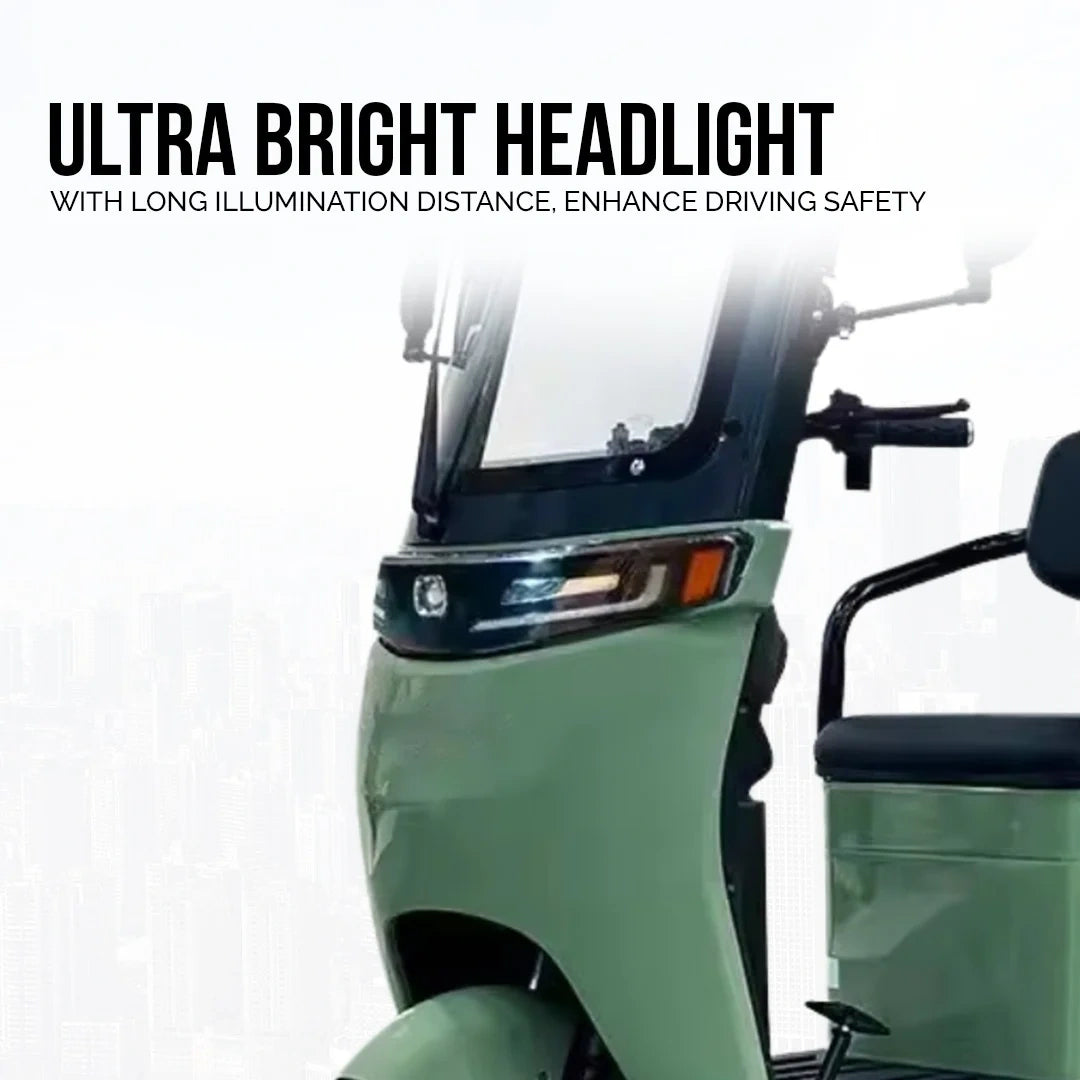Green scooter with ultra bright headlight feature on a white background