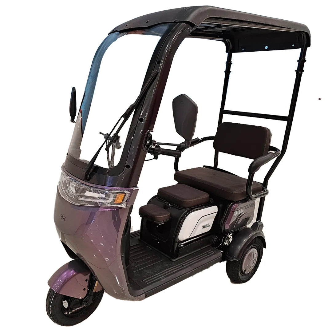 Electric rickshaw with a canopy on a white background