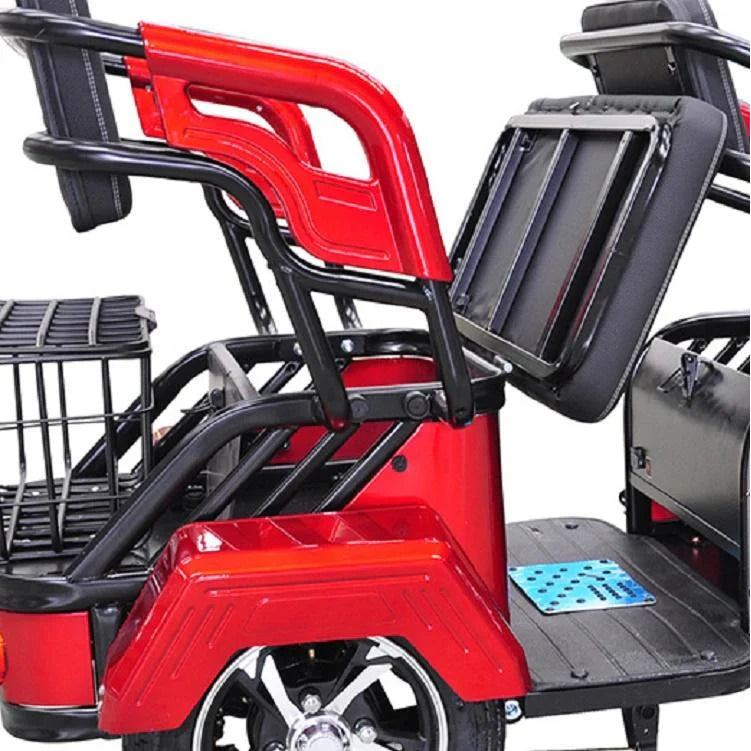 Red mobility scooter with a black basket and seat on a white background