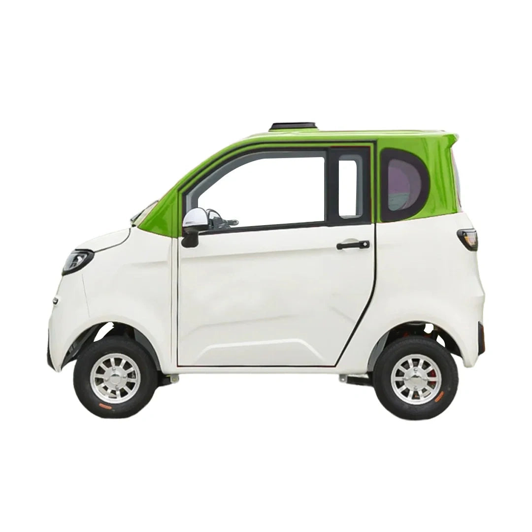 Small electric vehicle with a green roof on a white background
