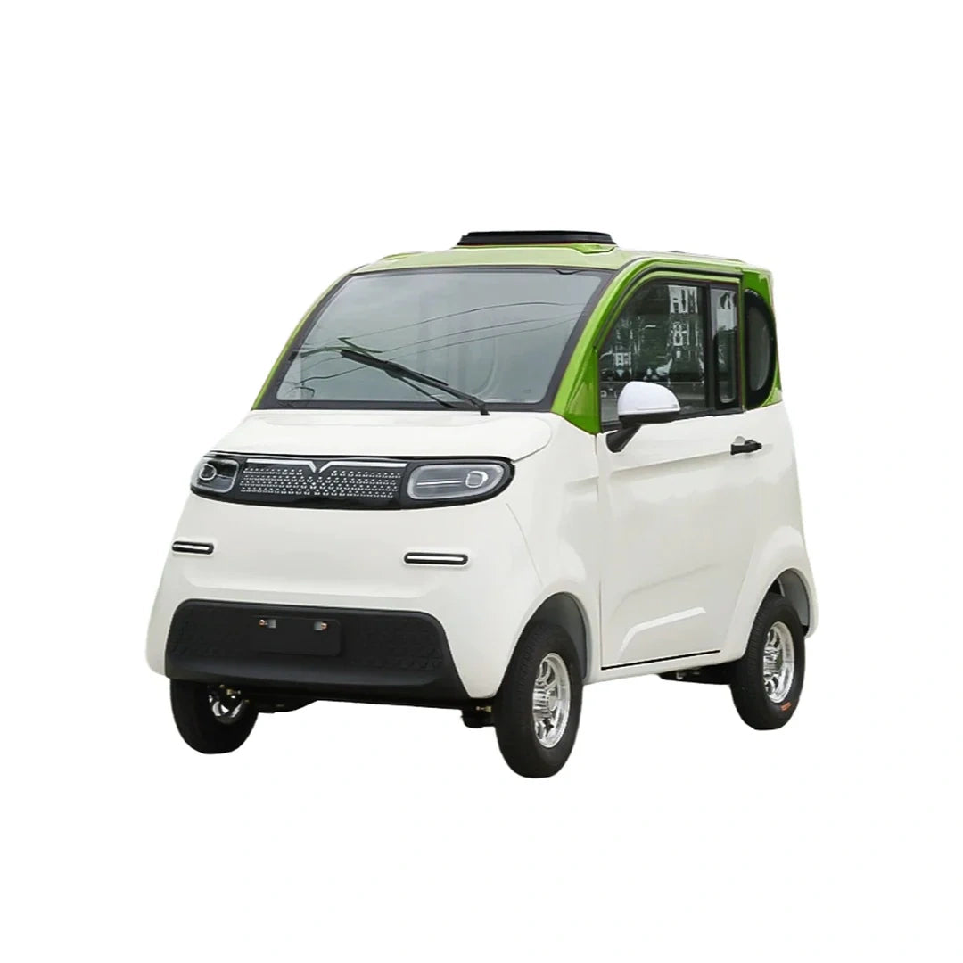 Small electric vehicle with a white body and green roof on a white background
