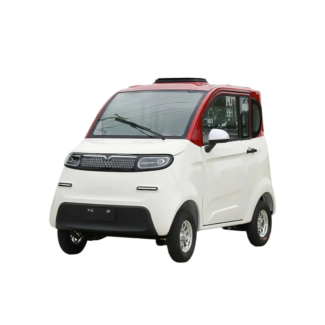 Small white and red electric vehicle on a white background