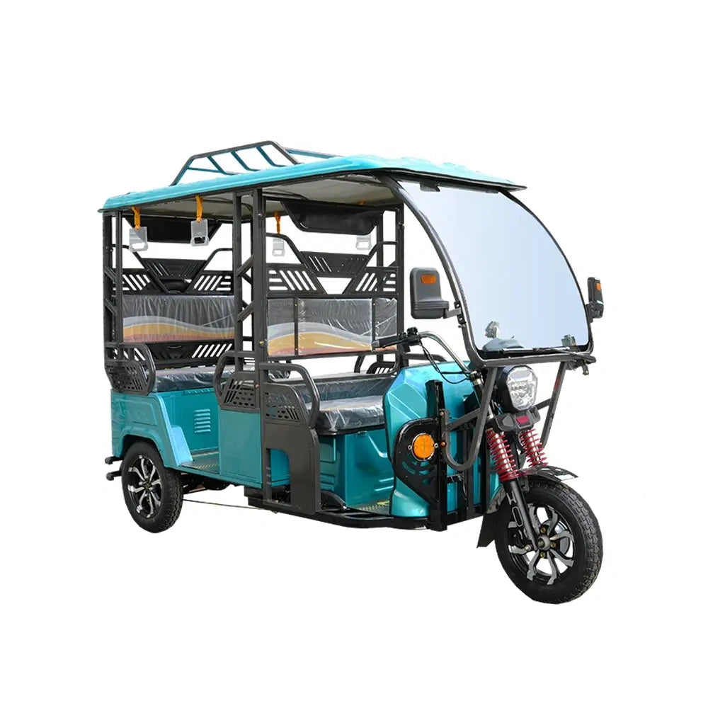 Turquoise electric rickshaw on a white background