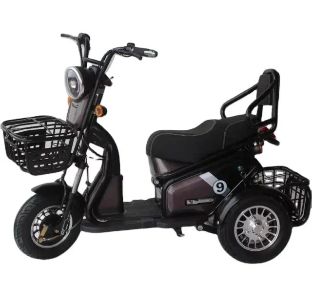 Black three-wheeled electric scooter with a basket on a white background