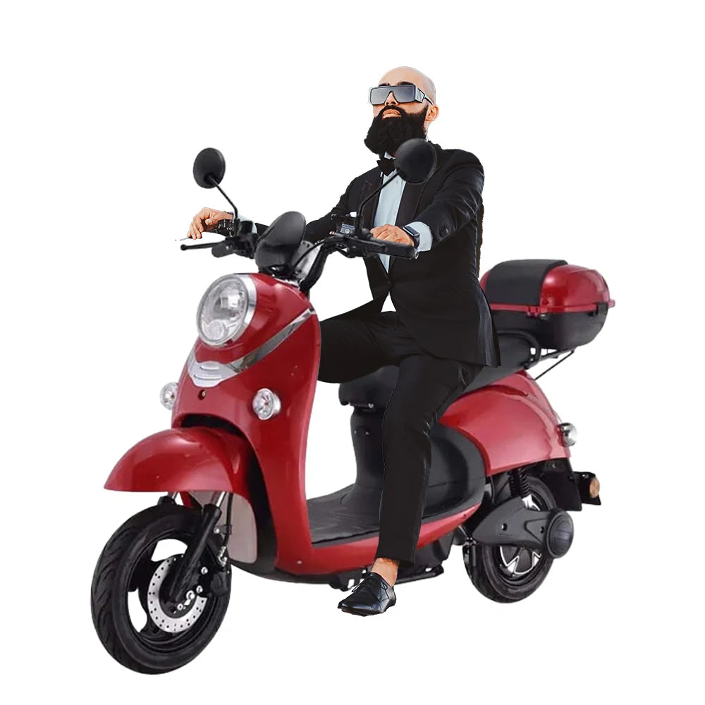 Man in a suit sitting on a red scooter with a white background
