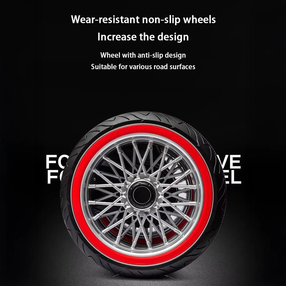 Motorcycle wheel with red rim and black tire on a dark background