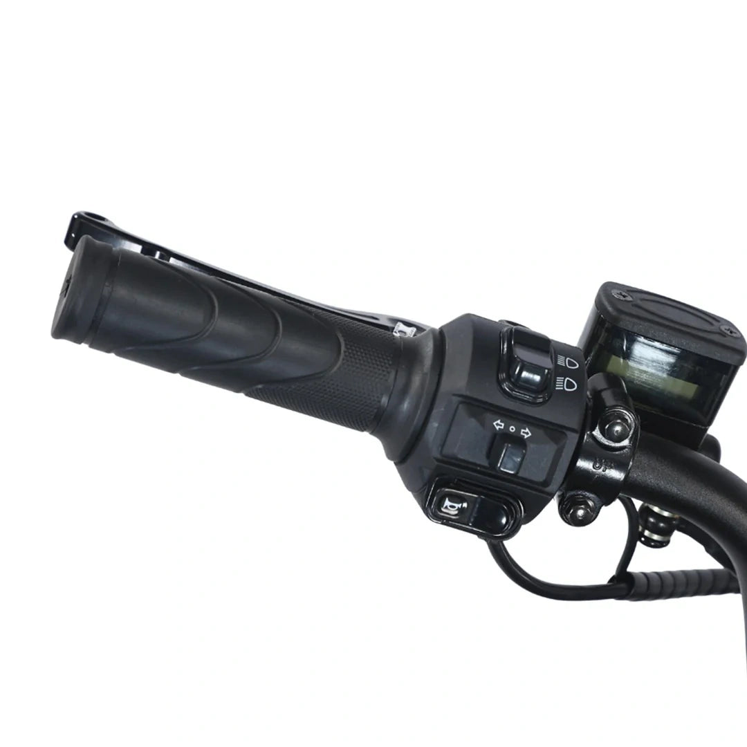 Close-up of a motorcycle handlebar with control buttons and display on a white background