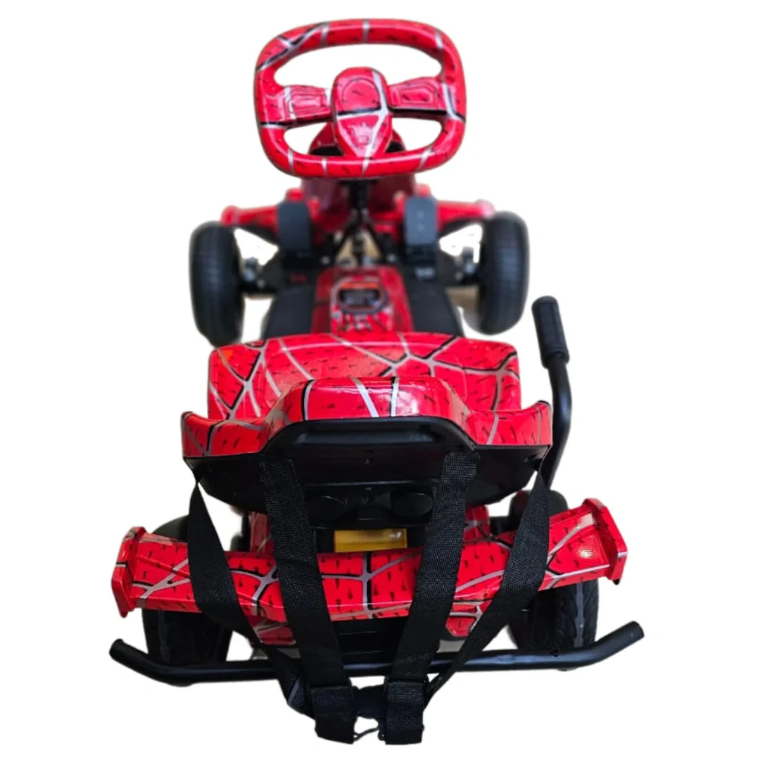 Red toy car with spider web design on a white background