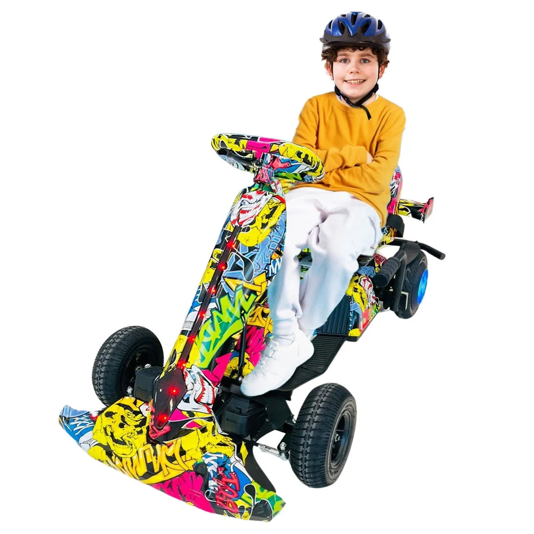 Child sitting on a colorful toy vehicle with a helmet on a white background
