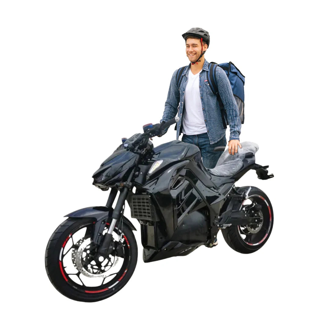 Man standing next to a black motorcycle on a white background