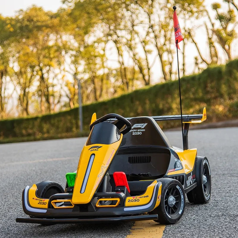 Yellow and black go-kart on a road with trees in the background