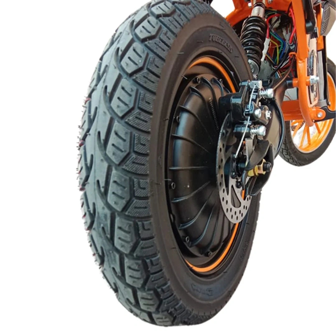 Close-up of a motorcycle tire with visible tread pattern on a white background