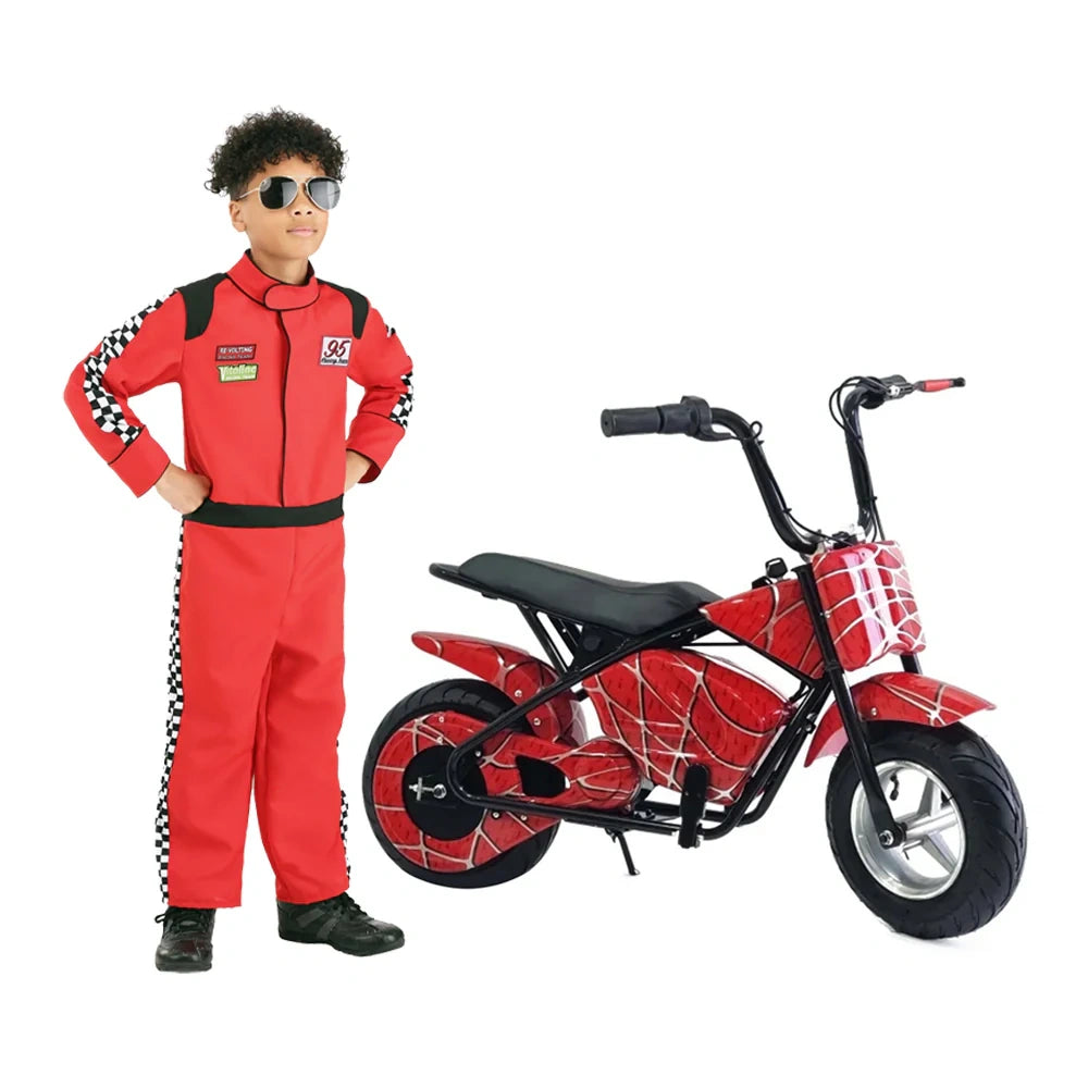 Child in a red racing suit standing next to a red toy motorcycle on a white background