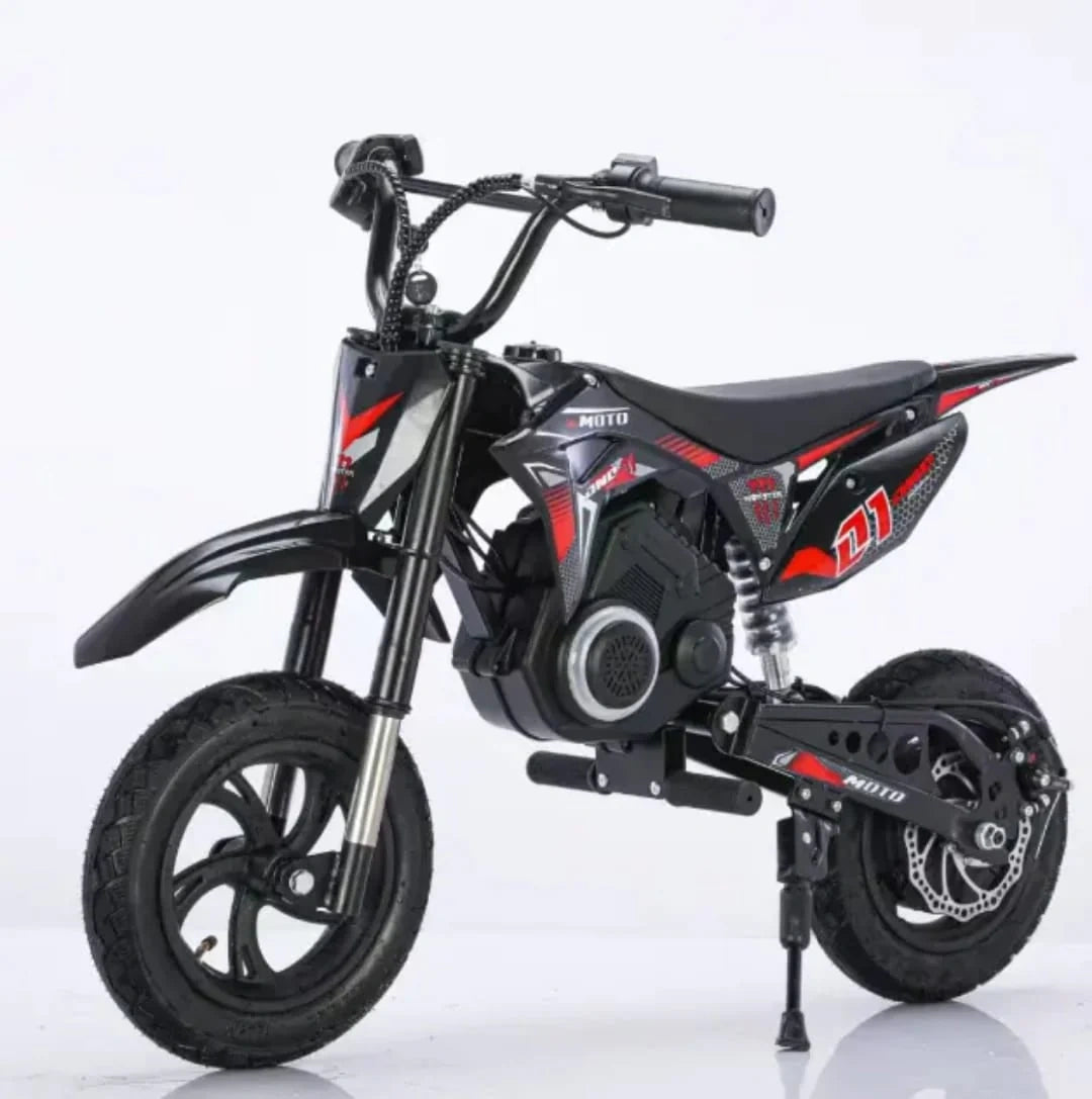 Black and red toy dirt bike on a white background