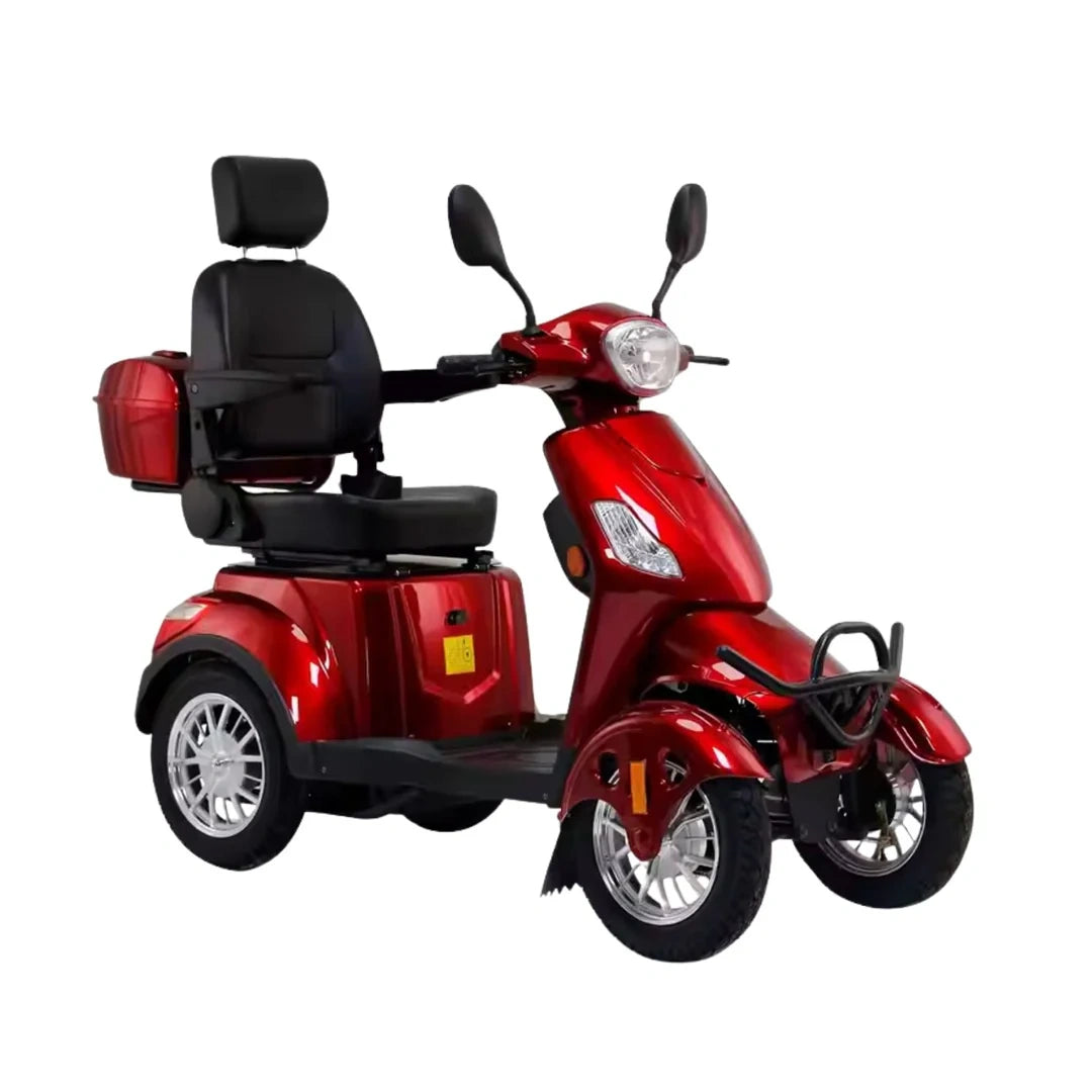 Red three-wheeled mobility scooter on a white background