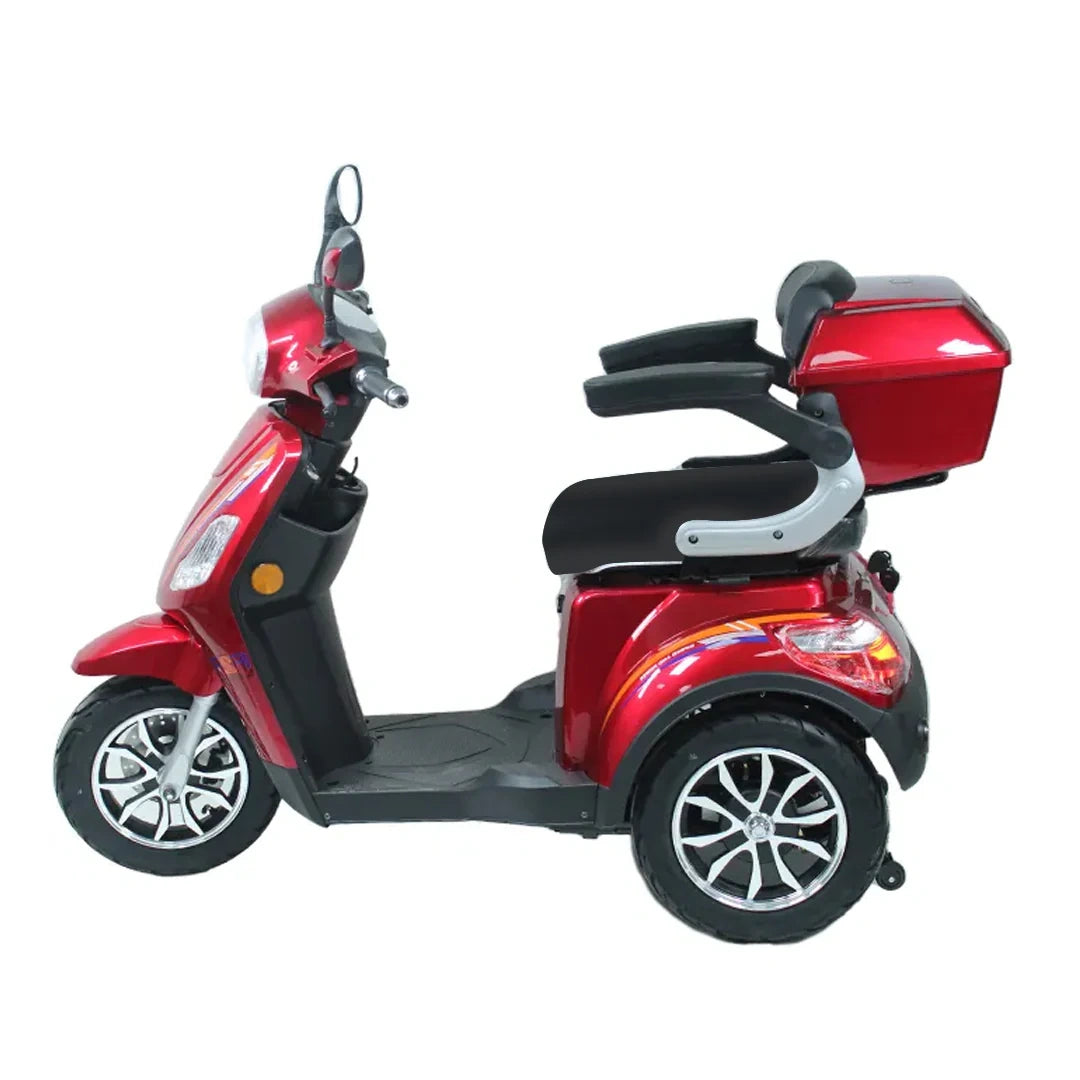 Red three-wheeled mobility scooter on a white background