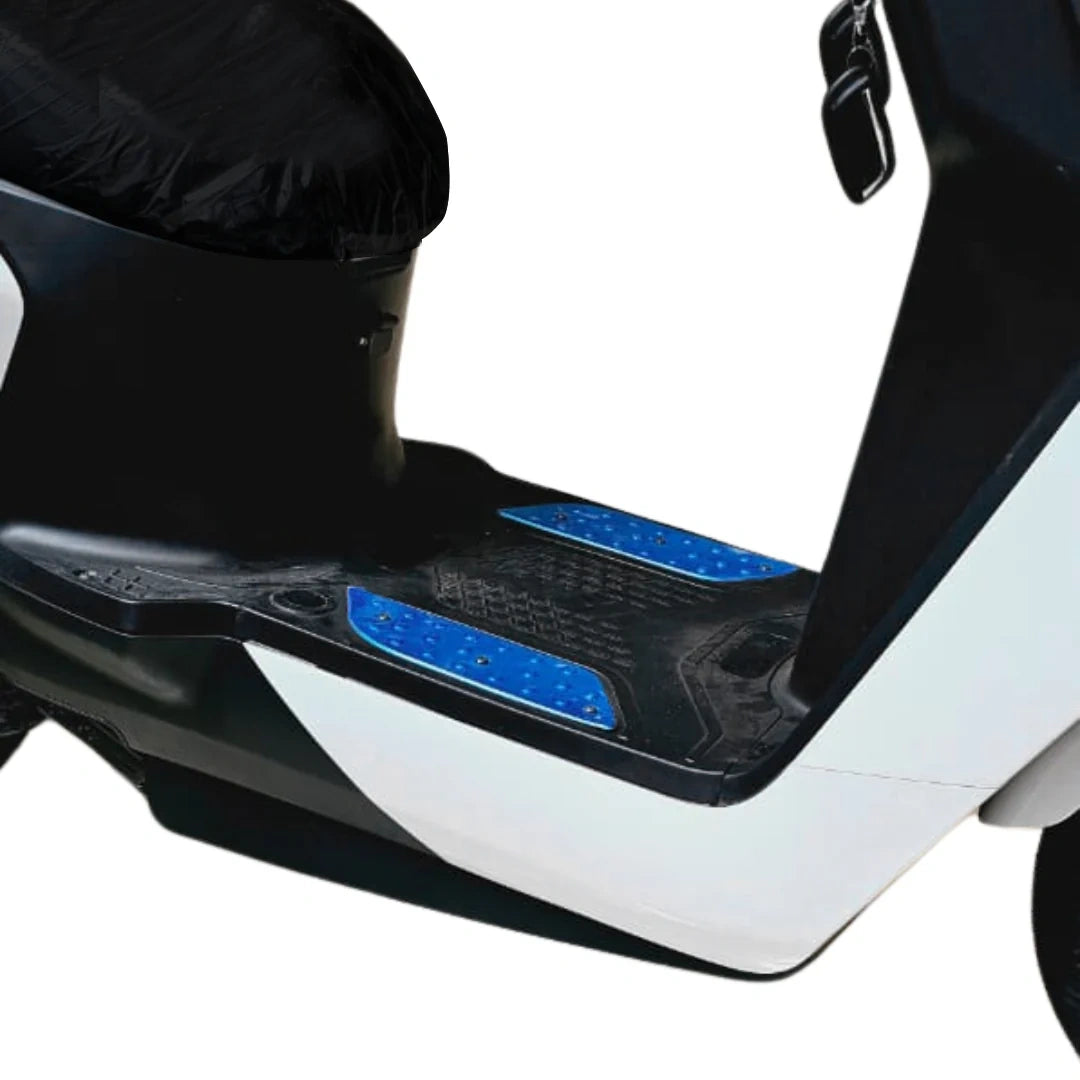 Close-up of a scooter with blue accents on a white background