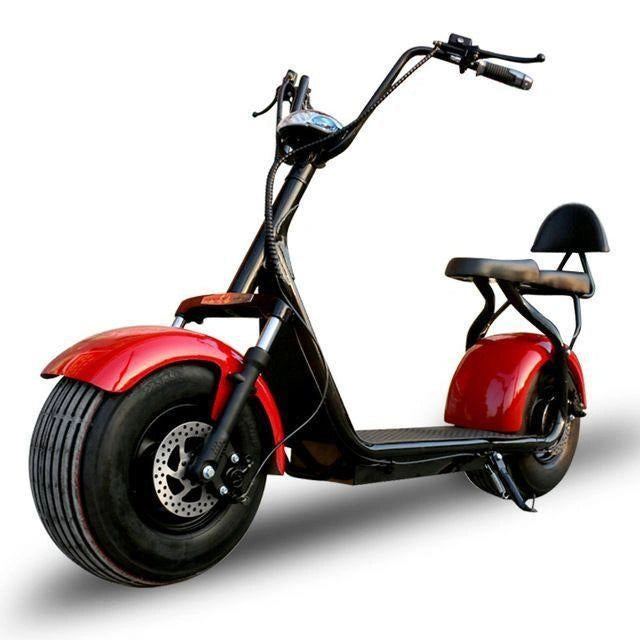 Red and black electric scooter on a white background