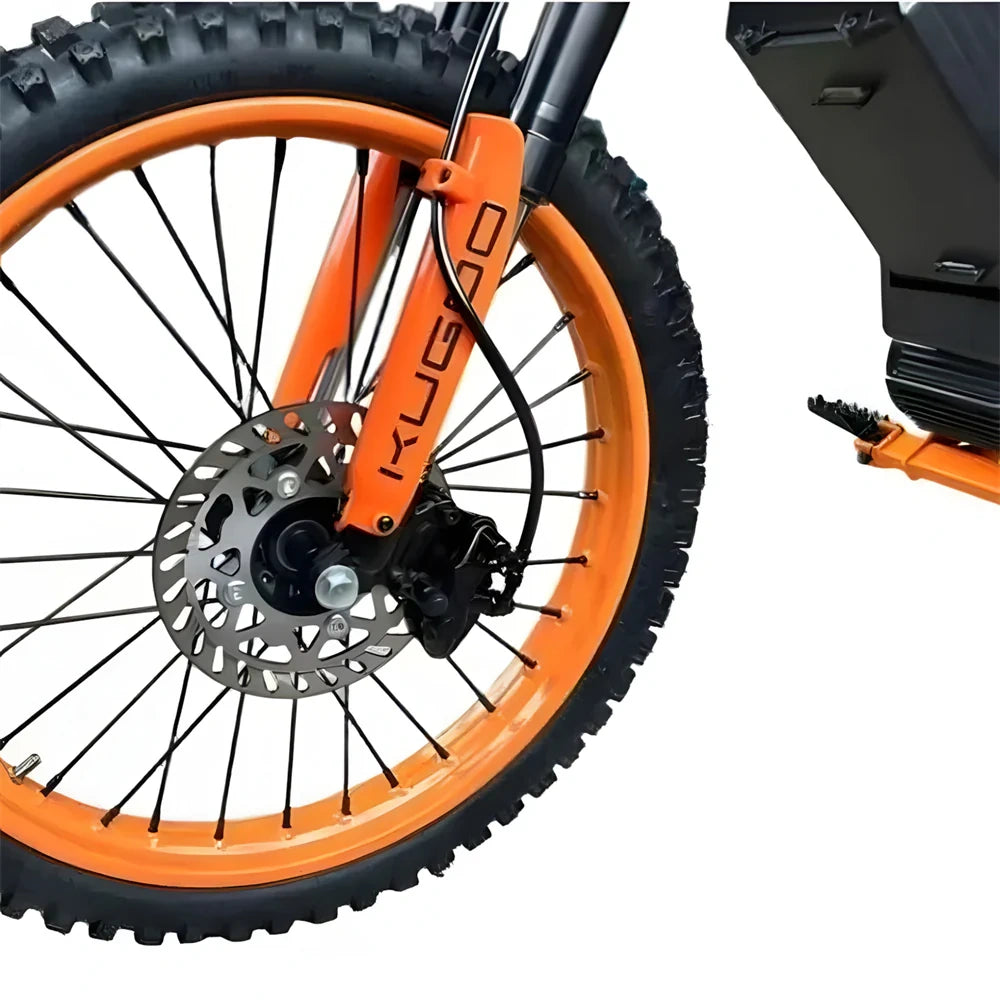 Close-up of an orange bicycle wheel with a visible brand logo on a white background