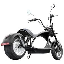 Black three-wheeled electric scooter on a white background