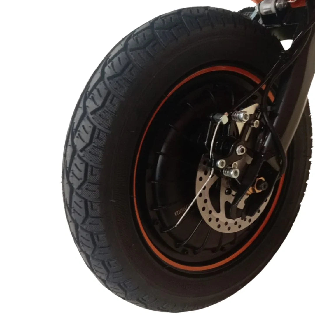 Close-up of a motorcycle wheel with a white background