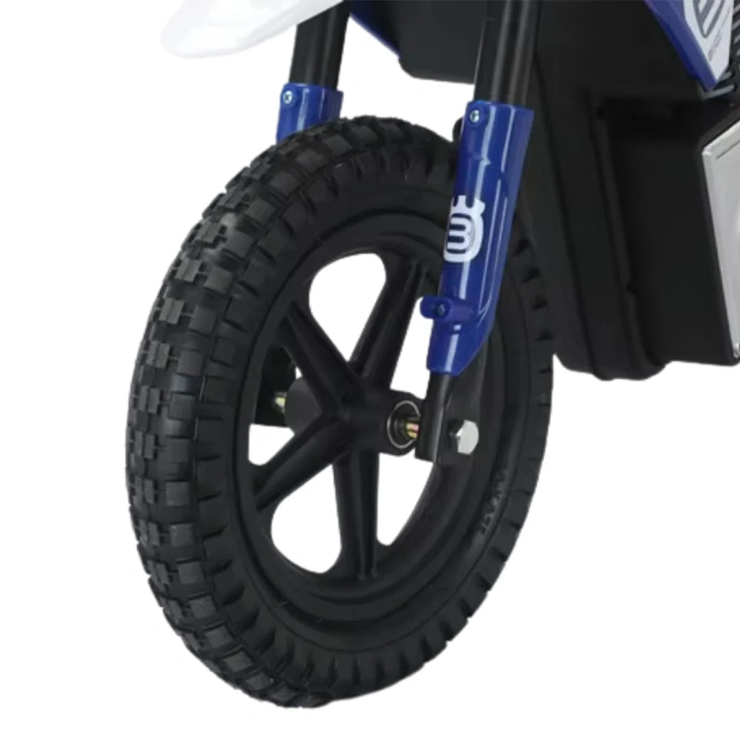 Close-up of a black tire with blue suspension fork on a white background
