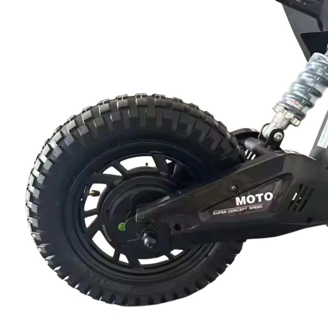 Close-up of a black scooter wheel with 'Moto' branding on a white background