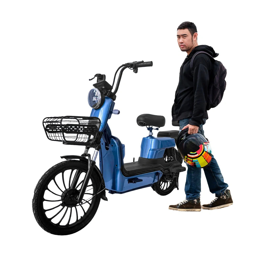 Man standing next to a blue electric bike on a white background