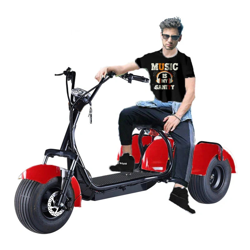 Person sitting on a red and black electric scooter with a white background