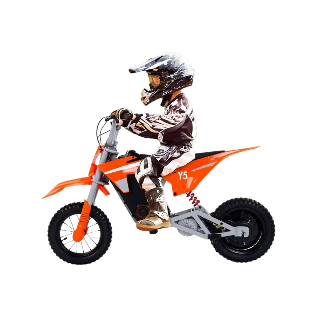 Child on an orange and black dirt bike with a helmet on a white background