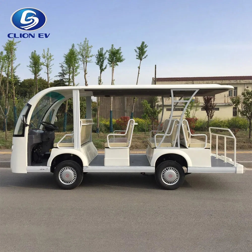 Electric sightseeing car with 'CLION EV' branding on a road with trees and buildings in the background.