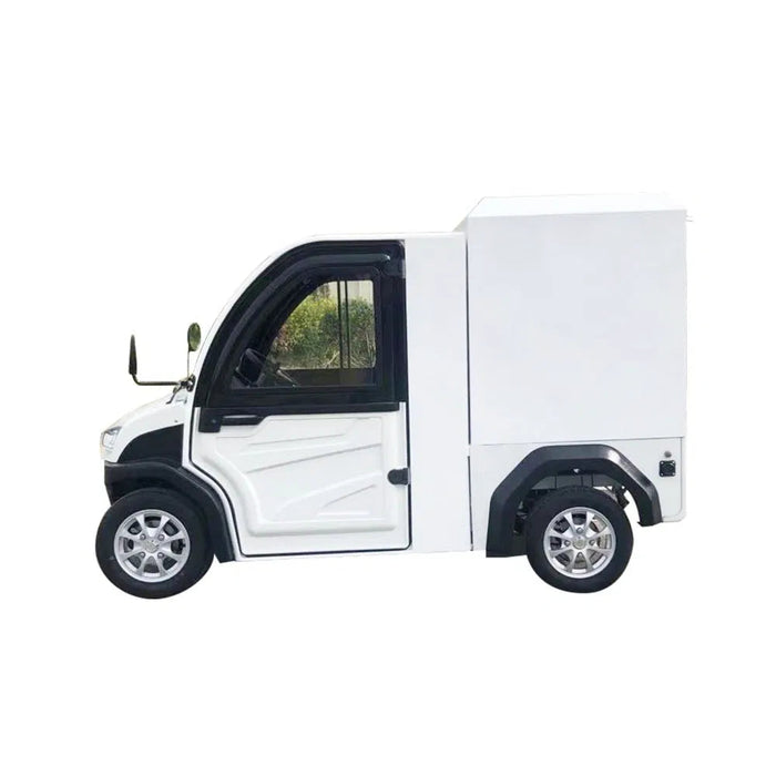 ocean cartz side profile studio shot of a white enclosed electric delivery vehicle with a large, box-style rear cargo area, set against a white background. This two-seater commercial NEV or electric utility truck features an enclosed cab with black window frames, a black roof, and small, multispoke silver alloy wheels. The vehicle is designed for efficient last-mile delivery and urban logistics.