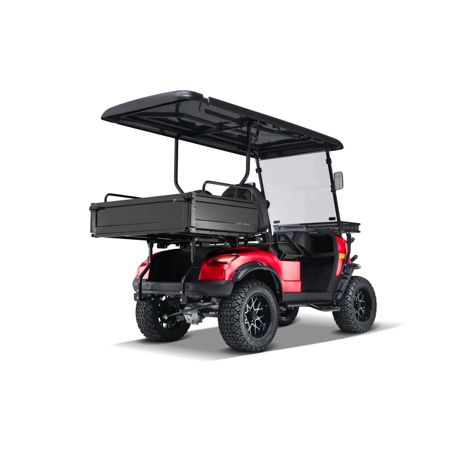 ocean cartz rear three-quarter studio shot of a red utility golf cart with a black roof and a black rear cargo bed that appears to be a dump or tilting box. This lifted off-road electric vehicle features a folding windshield and is equipped with large, knobby all-terrain tires on custom black and silver wheels. The image highlights the heavy-duty utility cart design for hauling and rugged terrain.