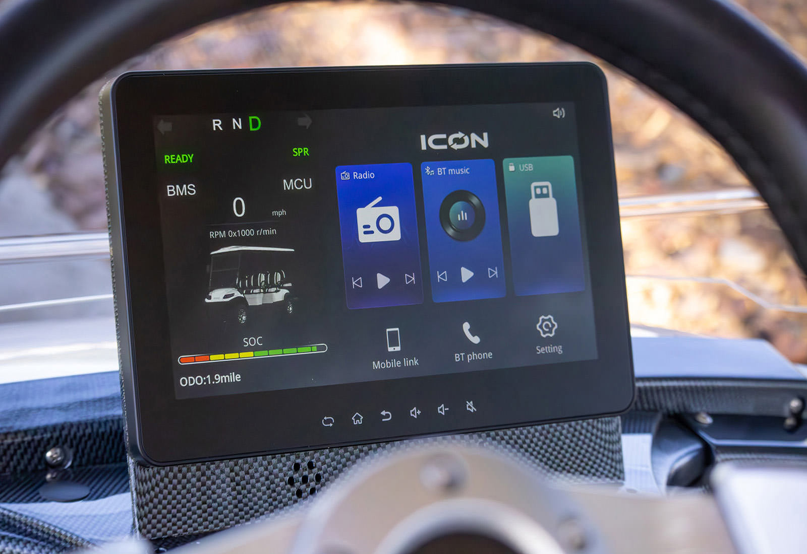 Car dashboard with an ICON digital display showing various functions.