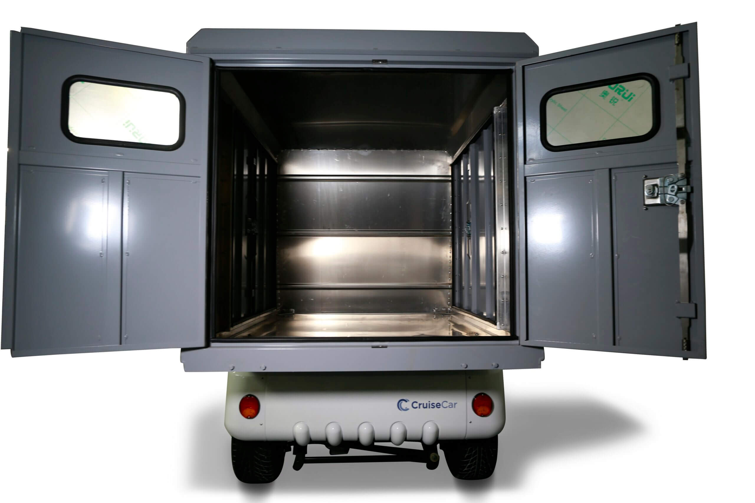 ocean cartz rear view of a white utility golf cart with a large, grey enclosed rear cargo box, set against a pure white background. The box's double doors are wide open, revealing the empty, silver-lined interior storage space and a small window on each door. The bottom panel of the electric service vehicle features red taillights and the "CruiseCar" logo, highlighting the maximum delivery and storage capacity of the work cart.