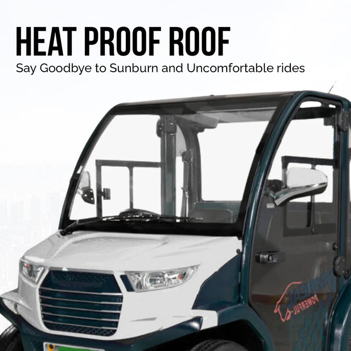 ocean cartz close-up promotional image highlighting the heat proof roof on a compact electric vehicle with an enclosed cabin. The shot shows the front windshield and the white and dark teal or green-blue exterior, with text promoting the heat proof roof for comfort and sun protection. This view emphasizes the all-weather features of the two-seater electric car or NEV.