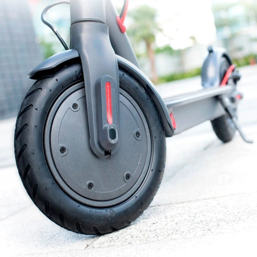 Close-up of a single-wheeled electric scooter on a blurred background
