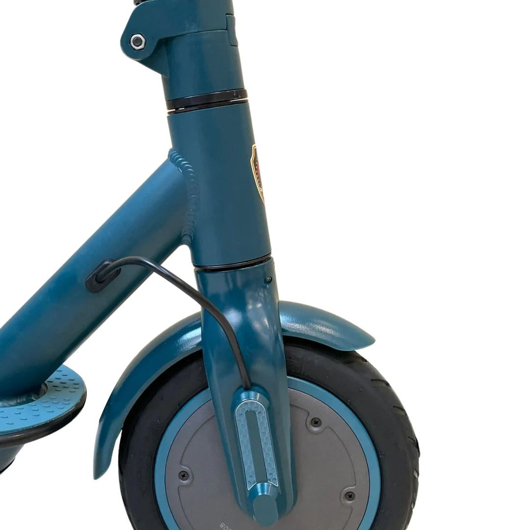 Blue balance bike with large wheels on a white background