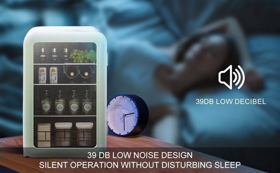 White noise machine on a table with a blurred background of a person using a smartphone, emphasizing low noise design.