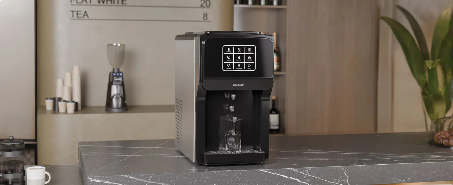 Black coffee machine on a kitchen counter with a blurred background