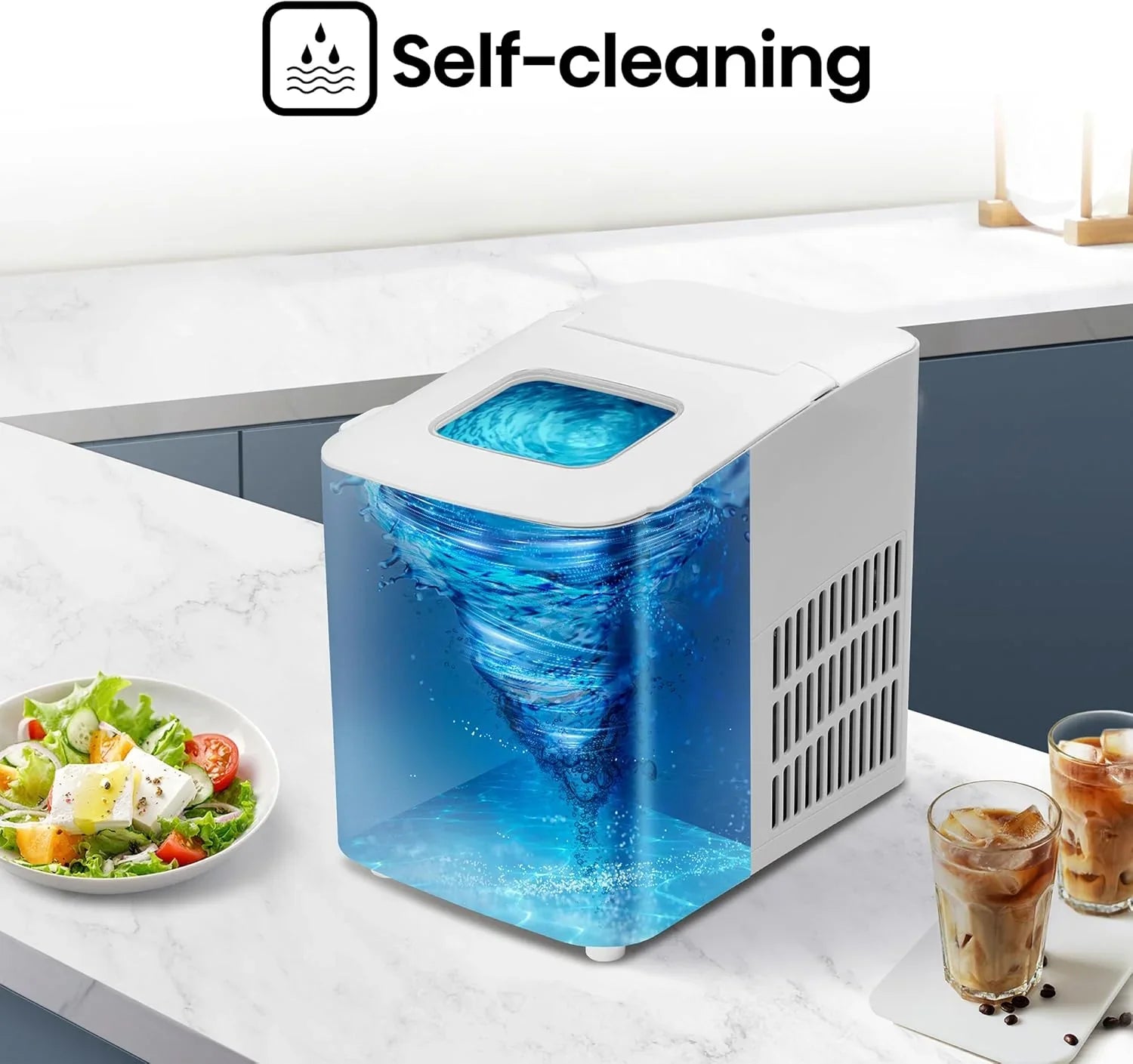 Self-cleaning ice maker on a kitchen counter with a salad and drinks in the background.