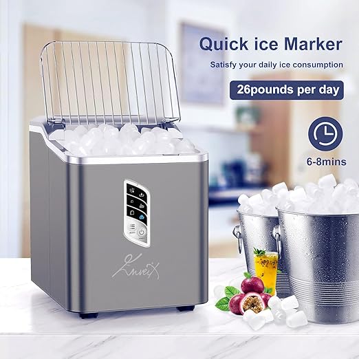 Ice maker with buckets of ice and a blurred kitchen background