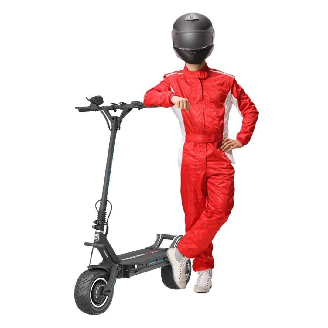 Person in a red racing suit and helmet standing next to a black electric scooter on a white background