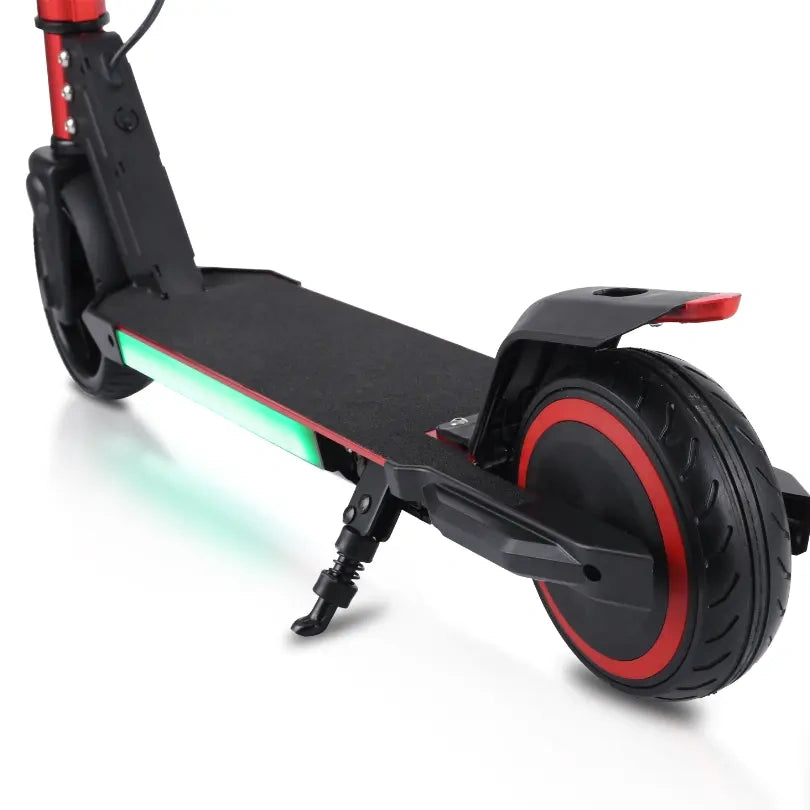 Black electric scooter with red accents on a white background