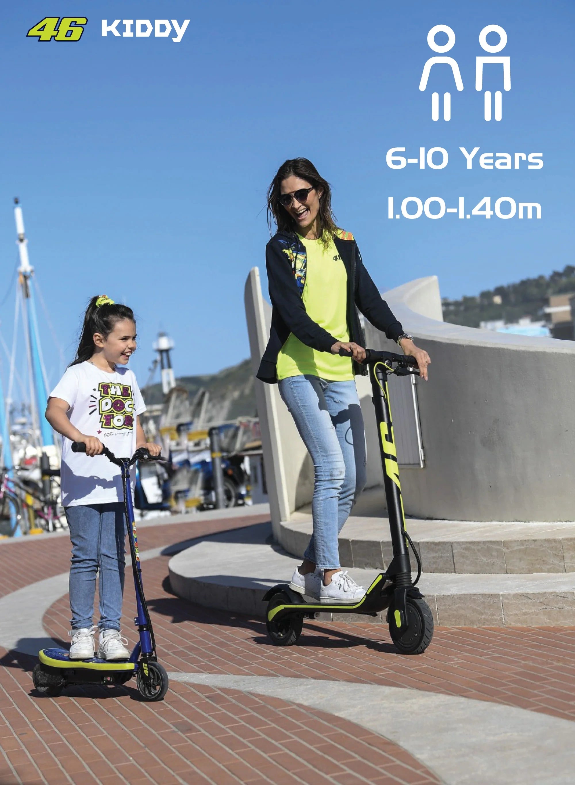 Woman and child with electric scooters on a waterfront promenade
