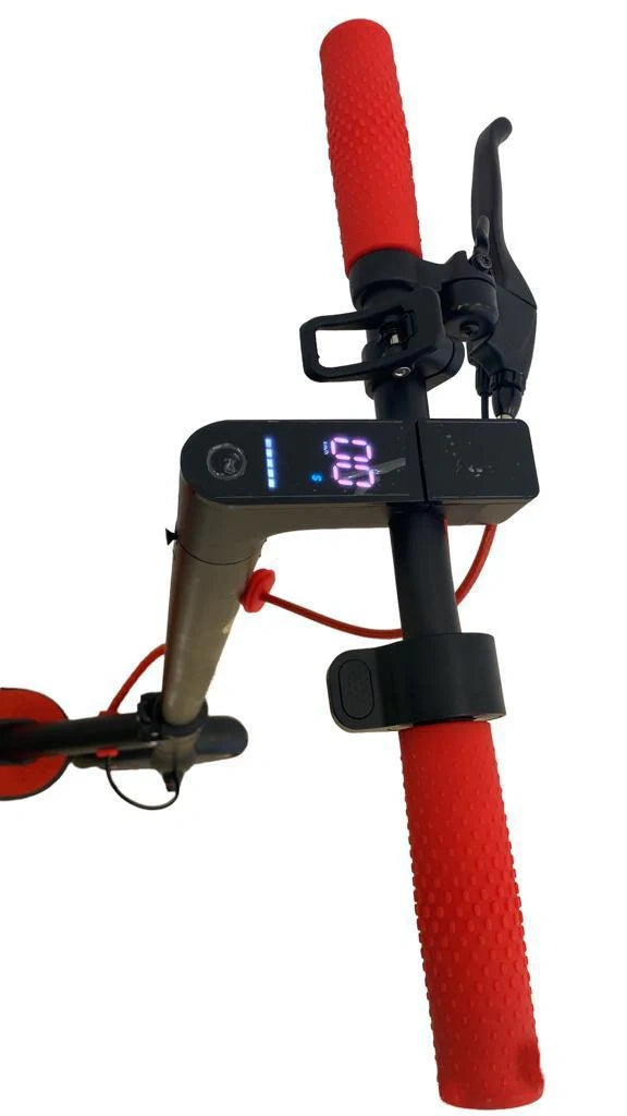 Close-up of a scooter handlebar with red grips and a digital display on a white background